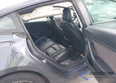 2021 Tesla Model 3 Standard Range Plus Rear-Wheel Drive z USA, uszkodzony, nr VIN 5YJ3E1EA9MF092030